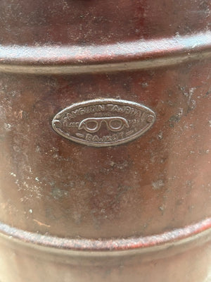 Image of Brown Indian Storage tin - badge