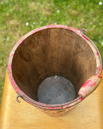 Image of vintage red bucket with great patina top view