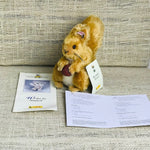 Image of Steiff Squirrel Nutkin with papers
