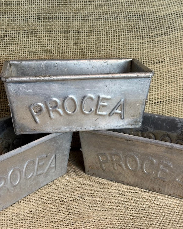 Image of Three 50's Procea bread tins closer view