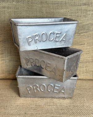 Image of Three 50's Procea bread tins stacked view 1