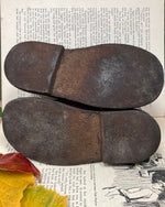 Image of Vintage brown boots sole view