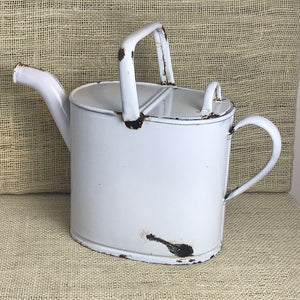 Image of White lidded enamel watering can facing left