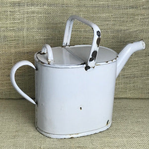 Image of White lidded enamel watering can facing right