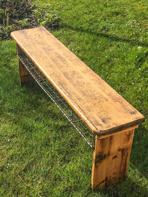 Wooden school bench with shoe rack