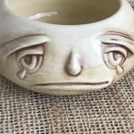 Image of Close up of face of Sylvac onion pot