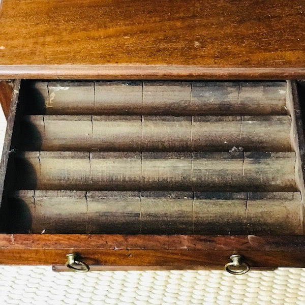 Image of Drawer showing where spools go in a haberdashers cabinet