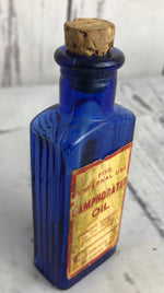 Set of three old Apothecary's Bottles