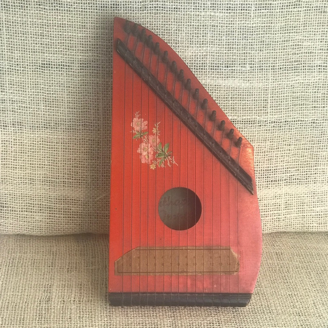 15 string red painted zither