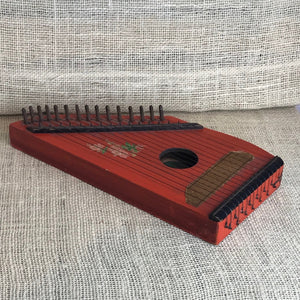 15 string red painted zither
