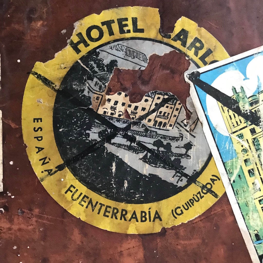 Vintage leather case with travel labels for restoration