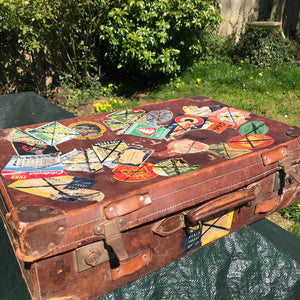 Vintage leather case with travel labels for restoration