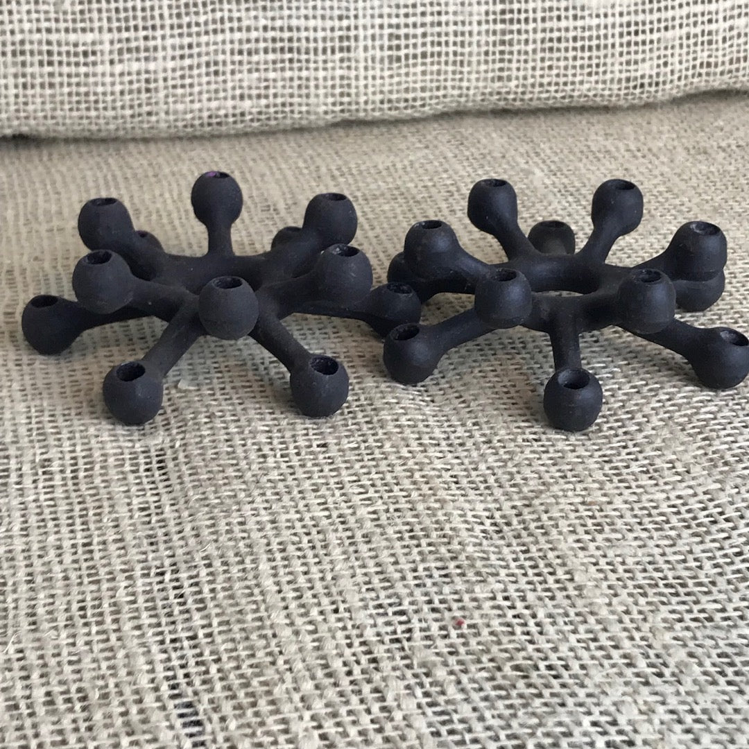 Pair of SPIDER candlesticks by Jens Quistgaard for DANSK Designs, 1963 with tapers