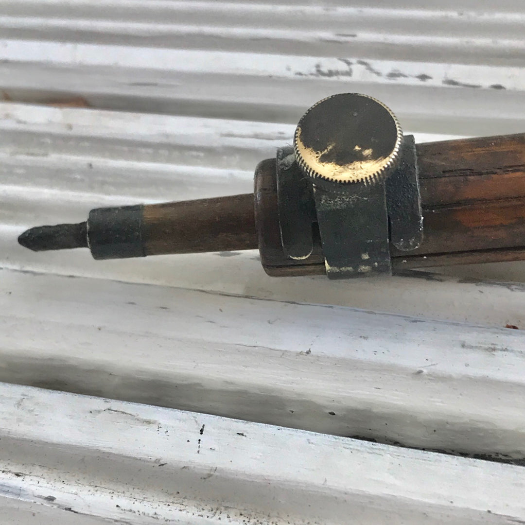 Vintage telescopic wood and brass camera tripod