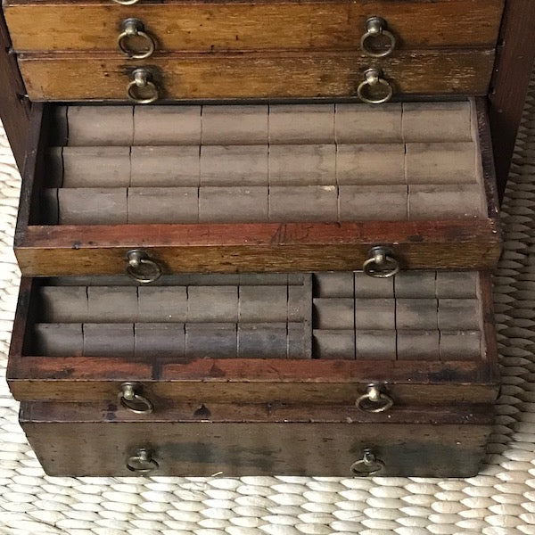 Image of Open drawers on a 10 drawer cotton reels cabinet
