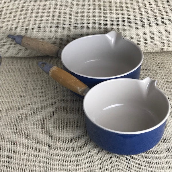 Pair of blue Le Creuset milk pans