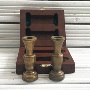 Pair of presentation brass candlesticks