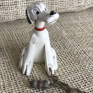 Image of Sitting Pluto toy with original magnetic bone