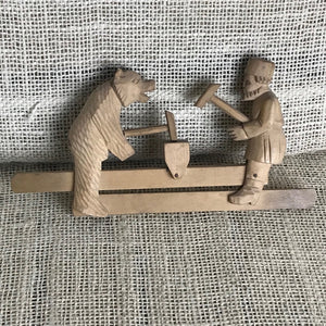 Image of Wood cutter and bear carved wooden toy