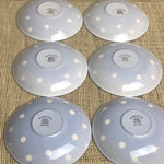Image of six TG Green Blue Domino saucers rear view